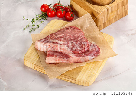 Uncooked raw beef steak for grill Uncooked raw beef steak for grill 111105545