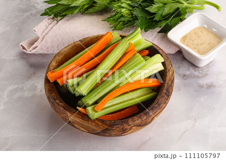 Vegan cuisine - dietary celery and carrot cticks Vegan cuisine - dietary celery and carrot cticks 111105797