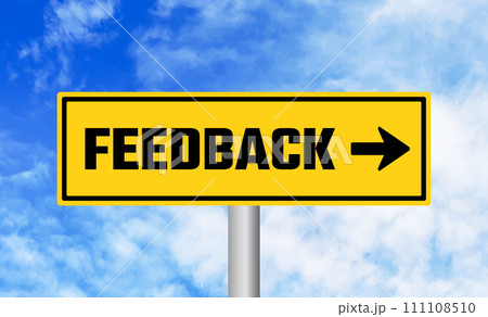 Feedback road sign on cloudy sky background Feedback road sign on cloudy sky background 111108510