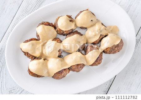 Swedish meatballs with cream sauce 111112782