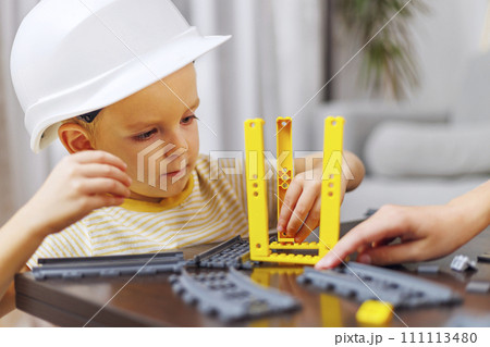 Young Child Engaged in Building Play Young Child Engaged in Building Play 111113480