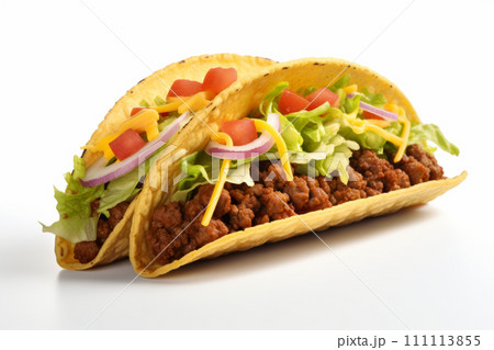 Juicy beef tacos topped with guacamole and veggies isolated on the white background Juicy beef tacos topped with guacamole and veggies isolated on the white background 111113855