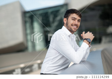 Good-looking young businessman feeling confident and determined Good-looking young businessman feeling confident and determined 111114299