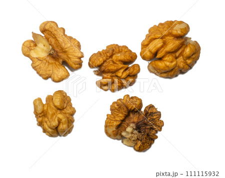 Half of the walnut kernels. Walnut insides. Healthy diet. Ingredients for meals. Walnut stuffing isolate. Half of the walnut kernels. Walnut insides. Healthy diet. Ingredients for meals. Walnut stuffing isolate. 111115932