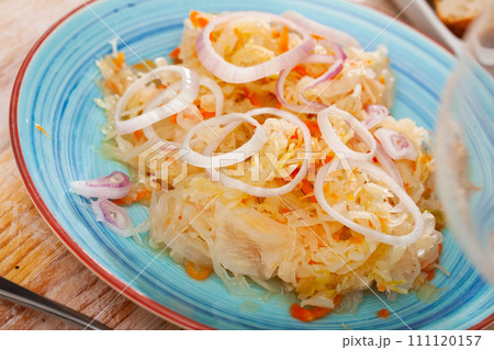 Homemade sauerkraut with onion 111120157