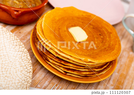 Machanka and pancakes - Belarusian cuisine, traditional assorted dishes closeup Machanka and pancakes - Belarusian cuisine, traditional assorted dishes closeup 111120307
