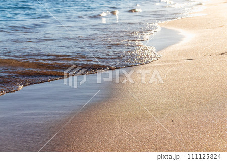 Soft wave of the sea on the sandy beach. Soft wave of the sea on the sandy beach. 111125824