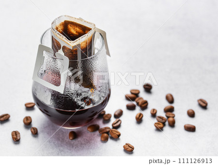A  glass of freshly brewed drip coffee 111126913
