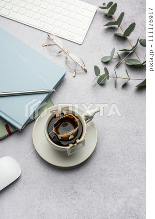A cup of freshly brewed coffee A cup of freshly brewed coffee 111126917