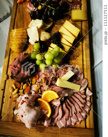 salami, cheese as great food background 111127511