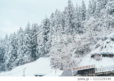 Beautiful view of Ginzan Onsen village with snow fall in winter season is most famous Japanese Hot Spring in Yamagata, Japan. Beautiful view of Ginzan Onsen village with snow fall in winter season is most famous Japanese Hot Spring in Yamagata, Japan. 111129146