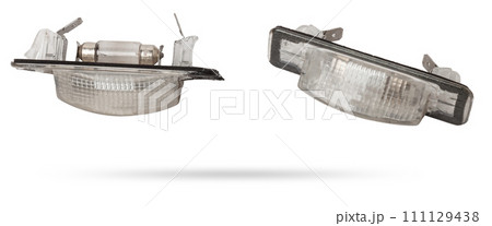 spare part from the car on a white isolated background is a cover for the illumination of a standard sign on the trunk lid for replacement and repair. Spare parts catalog. spare part from the car on a white isolated background is a cover for the illumination of a standard sign on the trunk lid for replacement and repair. Spare parts catalog. 111129438
