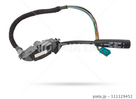 Steering wheel switches for cruise control disassembled on a white isolated background, spare part for car repair or for sale at junk yard. Steering wheel switches for cruise control disassembled on a white isolated background, spare part for car repair or for sale at junk yard. 111129452