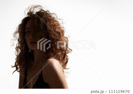 curly Hair Girl silhouette. Beautiful young Woman 111129670