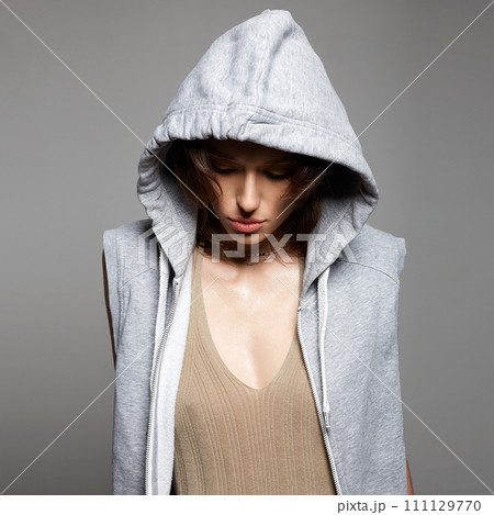 young woman in hood. sexy girl in hoodie young woman in hood. sexy girl in hoodie 111129770