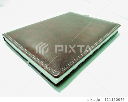 A picture of notebook isolated on white background A picture of notebook isolated on white background 111130073