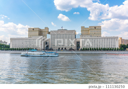 View of the Ministry of Defence of Russian Federation, and Moscow river embakment with cruise ships at sunset. 111130250