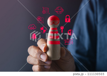 business protection, cybersecurity, cybercrime and hacker concept.businessman holding magnifier and searching wooden of thief hacker in business team. business protection, cybersecurity, cybercrime and hacker concept.businessman holding magnifier and searching wooden of thief hacker in business team. 111130503