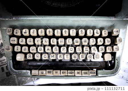 Antique typewriter cyrillic keys close up and russian keys selective focus 111132711