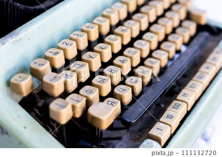 Antique typewriter cyrillic keys close up and russian keys selective focus 111132720