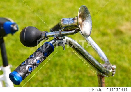 Vintage bicycle horn on handlebar 111133411