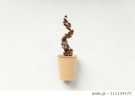 Floating Coffee Beans Above Cup Floating Coffee Beans Above Cup 111134577