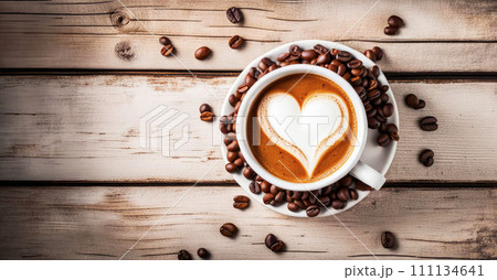 Coffee in white cup on wooden table with coffee beans Coffee in white cup on wooden table with coffee beans 111134641