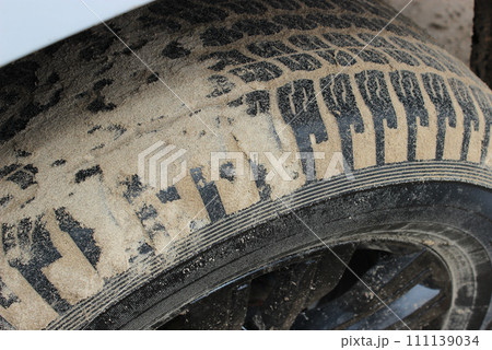 Traction control trouble. Tread pattern of tire packed with sand after off road driving 111139034