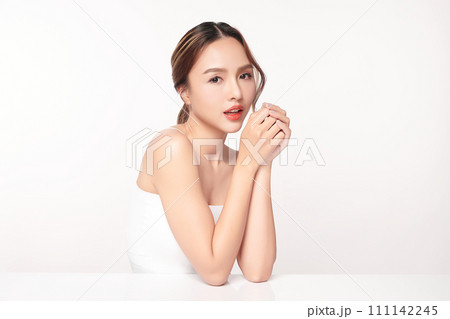 Beautiful young asian woman with clean fresh skin on white background, Face care, Facial treatment, Cosmetology, beauty and spa, Asian women portrait. Beautiful young asian woman with clean fresh skin on white background, Face care, Facial treatment, Cosmetology, beauty and spa, Asian women portrait. 111142245