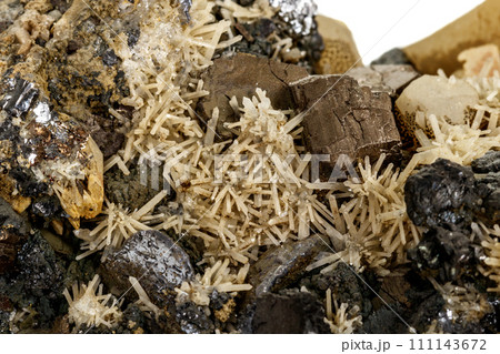 Macro stone mineral Pyrrhotite, quartz, Sphalerite, calcite, Galena on white background 111143672