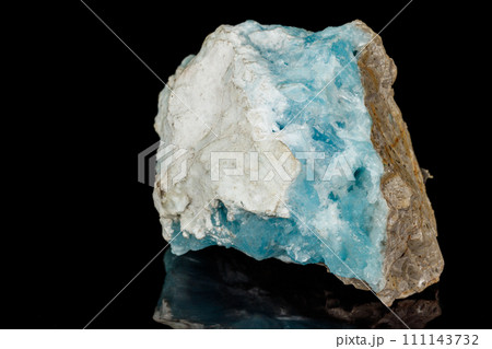 Macro stone cobalt calcite mineral on a black background Macro stone cobalt calcite mineral on a black background 111143732