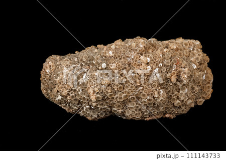 Macro stone Aragonite mineral on a black background Macro stone Aragonite mineral on a black background 111143733