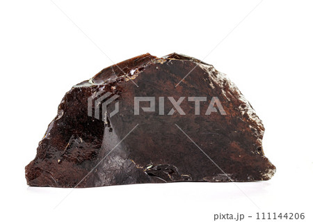 Macro Obsidian mineral stone on white background 111144206