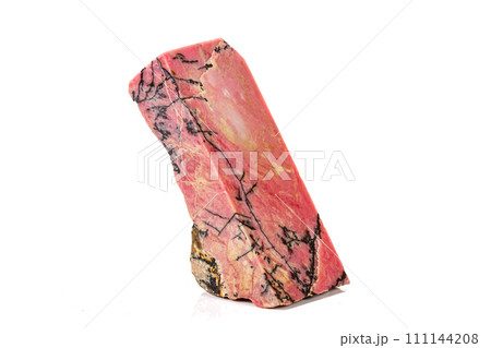 Macro stone Rhodonite mineral on white background Macro stone Rhodonite mineral on white background 111144208