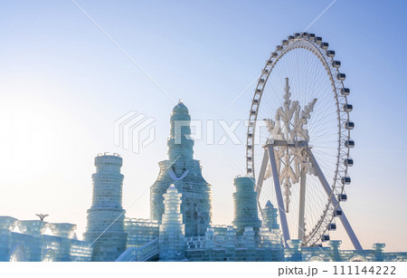 The giant snow ferris wheel in Harbin International Ice and Snow Sculpture Festival at Harbin, China. It is the world largest ice and snow festival. 111144222