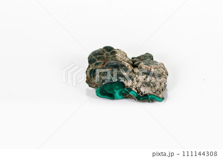 Macro mineral stone Malachite against white background Macro mineral stone Malachite against white background 111144308