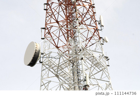 Telecommunication tower with clear sky background. 111144736