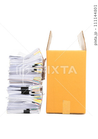 Stack of Documents and corrugated cardboard box isolated on white background. Stack of Documents and corrugated cardboard box isolated on white background. 111144801