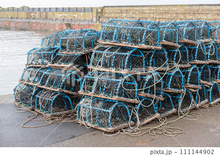 Group of fist net traps 111144902
