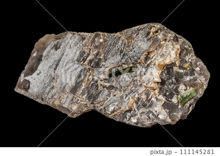 Macro stone tourmaline mineral on a black background Macro stone tourmaline mineral on a black background 111145281