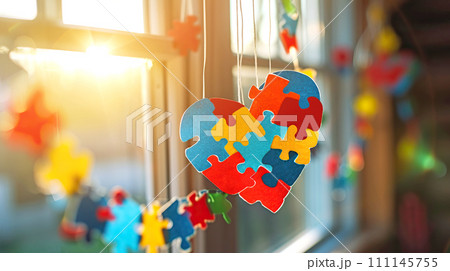 Window is decorated with colorful puzzles and bright hearts for World Autism Day. Generated AI 111145755