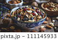 Organic Culinary Magic: Raw Homemade Trail Mix Featuring a Medley of Nuts and Fruits, a Tasty Journey Awaits 111145933