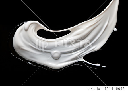 white liquid splash isolated on black background 111146042