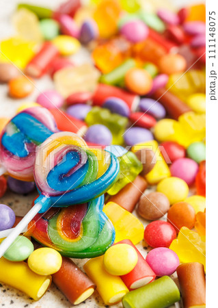 Colorful sweet jelly candies and lollipops. Sweet candies. Colorful sweet jelly candies and lollipops. Sweet candies. 111148075