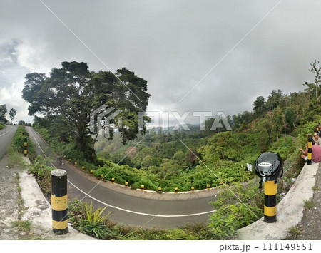 The road is in the middle of forests and mountains which are cloudy and cool The road is in the middle of forests and mountains which are cloudy and cool 111149551
