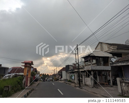 Twilight atmosphere on a beautiful village street in the afternoon Twilight atmosphere on a beautiful village street in the afternoon 111149585