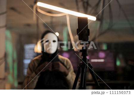 Smartphone recording hacker asking money for ransom on internet, mobile ransomware cyberattack, anonymous threatening victim. Online scam, cybercrime fraud, malicious software Smartphone recording hacker asking money for ransom on internet, mobile ransomware cyberattack, anonymous threatening victim. Online scam, cybercrime fraud, malicious software 111150373