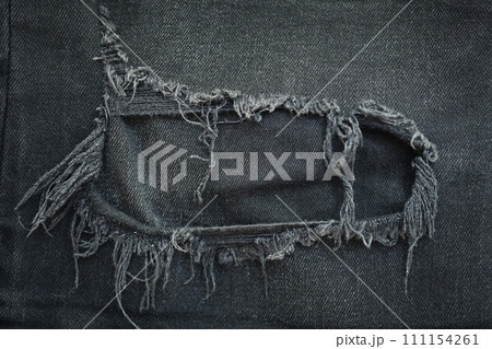 torn black danim texture background, textile of jeans fashion for clothing design 111154261