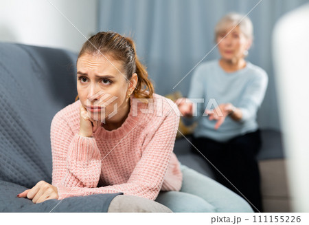 Mother encouraging her depressed adult daughter 111155226