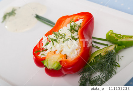 Stuffed half of pepper with brynza, dish of Bulgarian cuisine Stuffed half of pepper with brynza, dish of Bulgarian cuisine 111155238